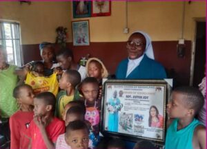 sr showcasing a milestone with the children
