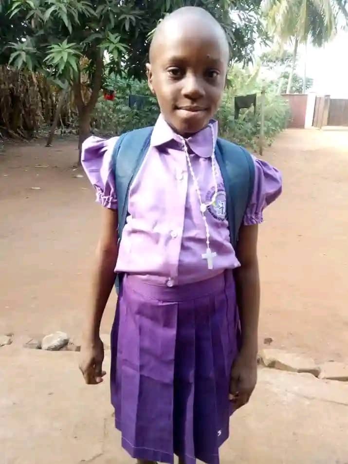 one of the children on school uniform