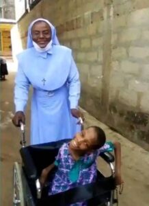 sr founder taking care of physically challenged child in the home